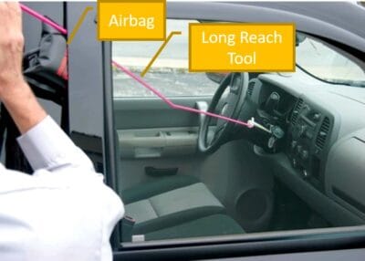 Using a long-reach tool to open a locked car