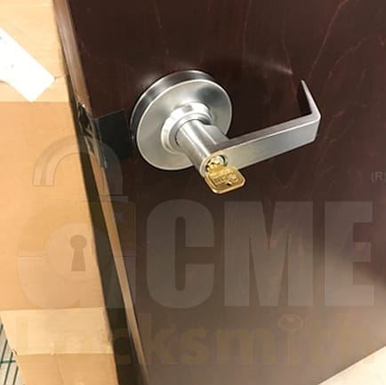 Rekey business door lever in Peoria.